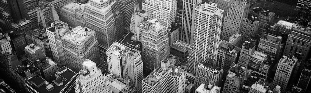 A stunning black and white aerial shot capturing the iconic New York City skyline's intricate architecture.