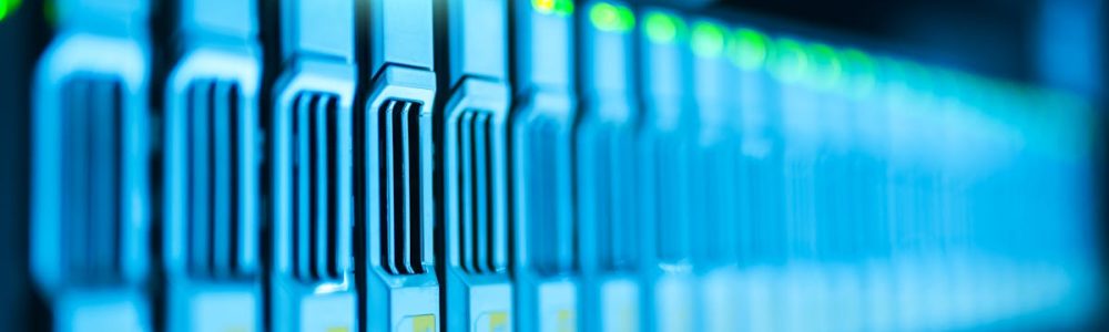 Detailed image of a server rack with glowing lights in a modern data center.