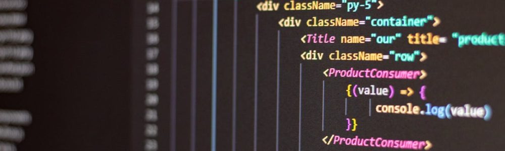 Close-up of HTML and JavaScript code on a computer screen in Visual Studio Code.