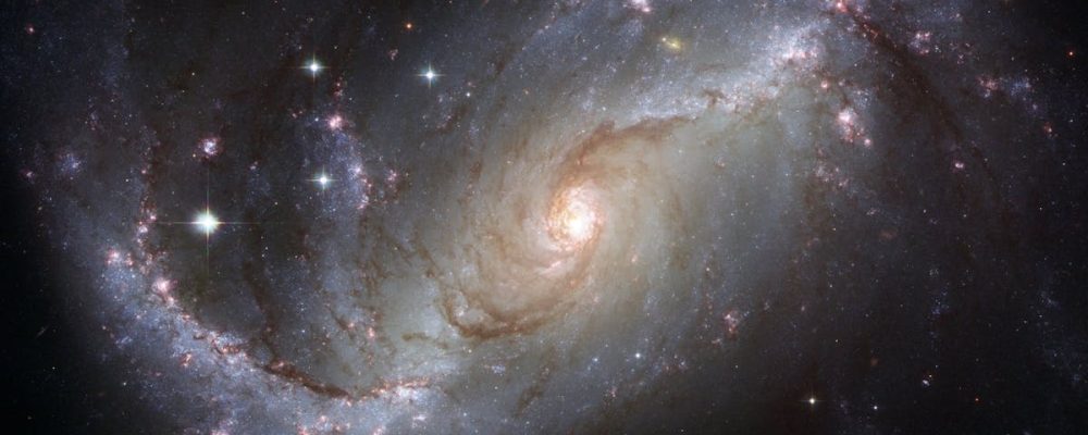 Capture of the NGC 1672 spiral galaxy showcasing its majestic spiral arms and bright core.